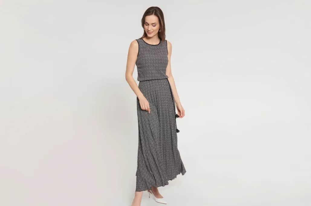 Jak dopasować długość sukienki do wzrostu? Porady i triki